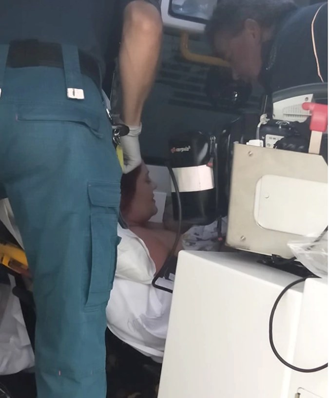 Josh Martin's view as he approached the ambulance, when Green was placing baby Andrew on Hall's chest straight after the delivery.Image: Supplied