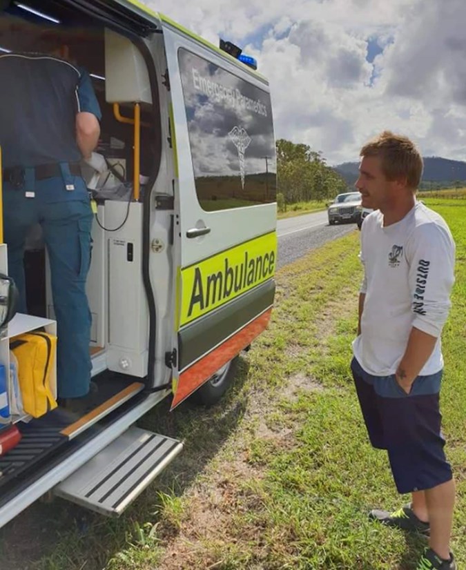 Hall's partner Josh Martin beside the ambulance.Image: Supplied