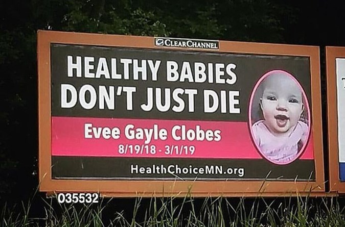 Anti-vax billboard with Evee's face on it. Image: Facebook.