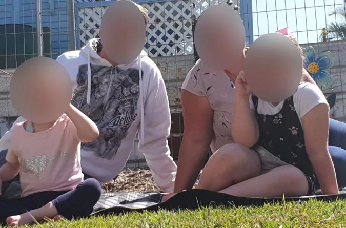 The mum allegedly lied about her daughter, far right, having a brain tumour. Image: Facebook
