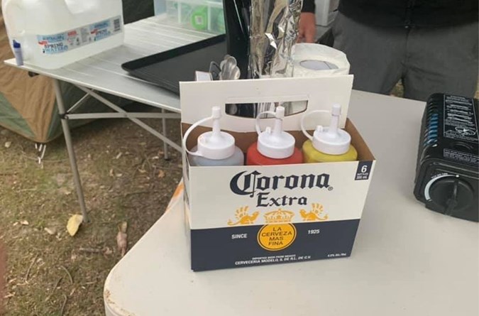 Genius $2 Coles sauce bottle camping hack. Image: Facebook