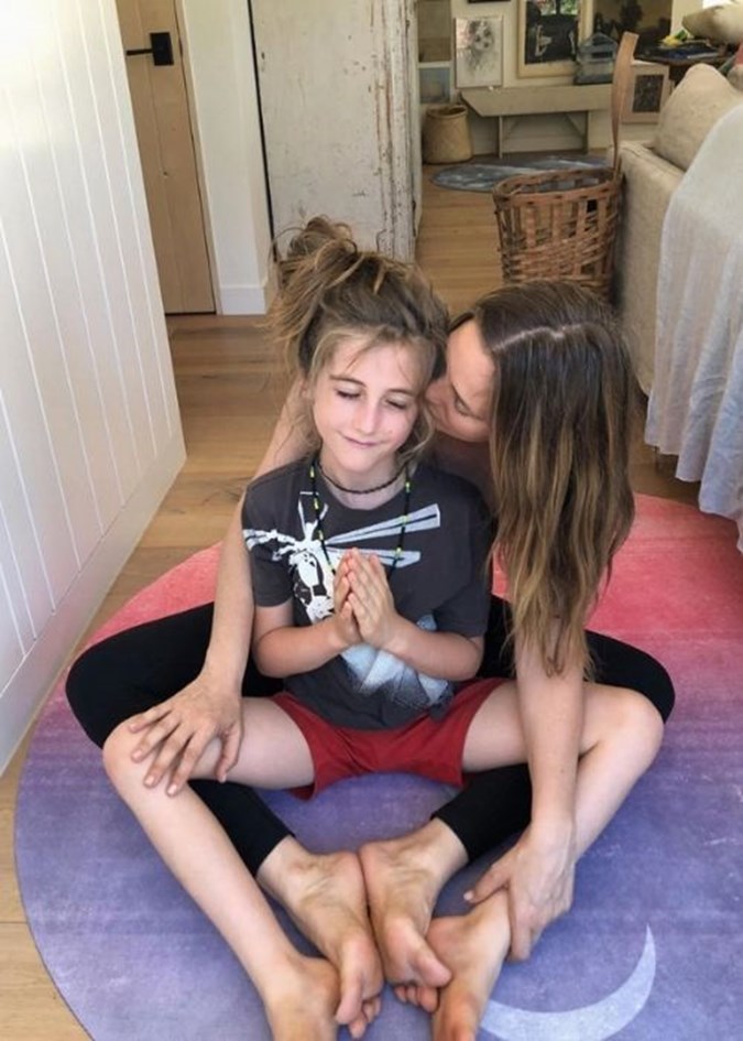 Alicia and Bear practicing Yoga. Image: Instagram