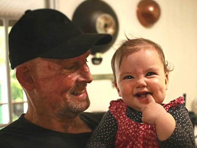 Matt Golinski and his baby daughter Aluna