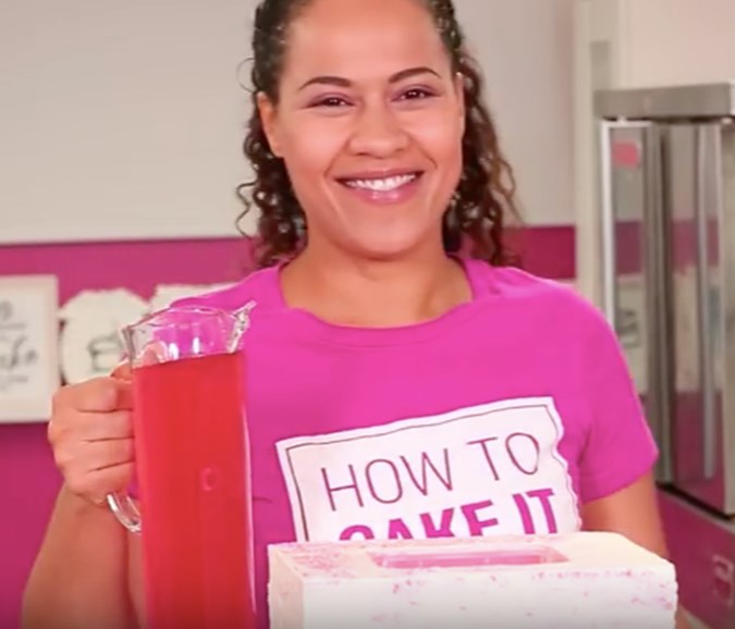 Filling the cake with juice! Credit: How To Cake It/Youtube