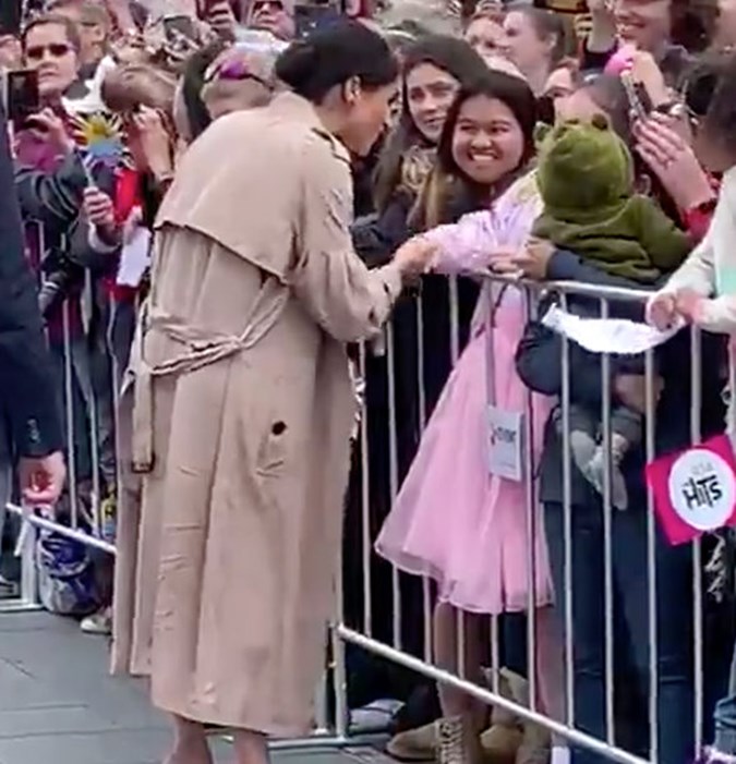 Katharina hands the slime to Meghan. Twitter